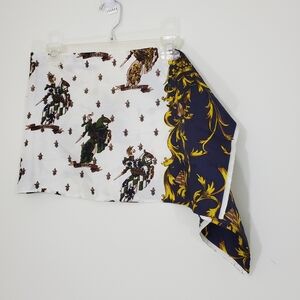 vintage scarf with a jousting knights motif and horses